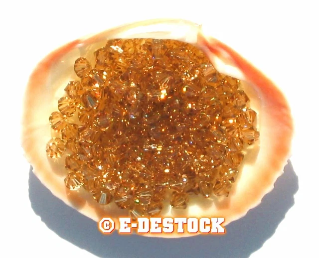 25 Perles Toupies 4mm cristal Swarovski - TOPAZ