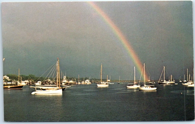 A late afternoon rainbow in Padanaram Harbor in South Dartmouth, Massachusetts