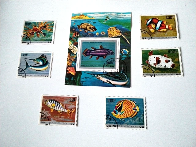 COMORES : pochette de 200 timbres (Oblitérés