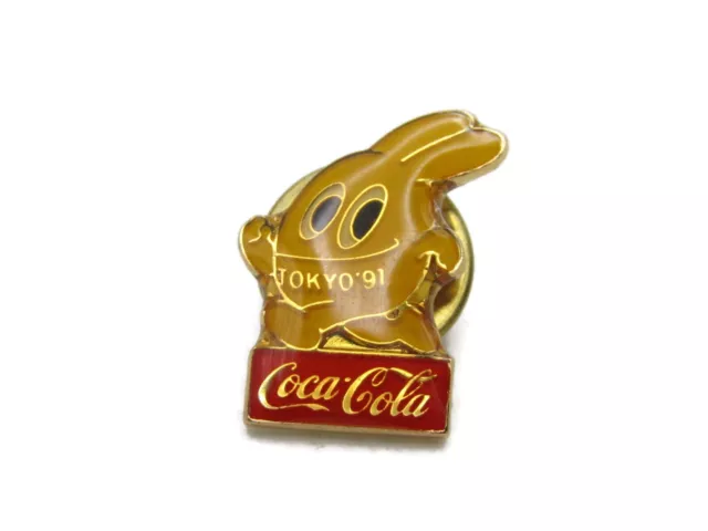 Tokyo '91 Coca Cola Lettered Pin Yellow Cartoon Graphic & Gold Tone