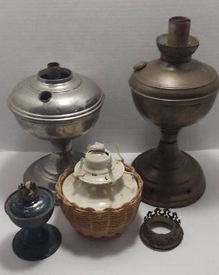 lot of four vintage metal oil lamps brass and tin silver wicker basket kerosene