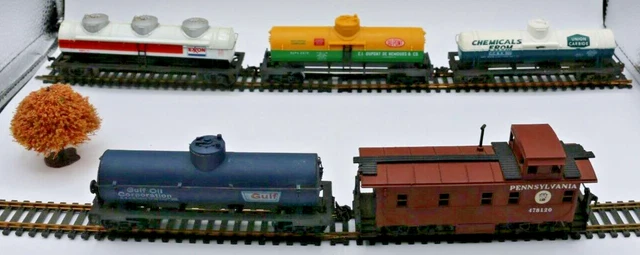 HO Scale Lot of Four Tankers, Pennsylvania Caboose, Track, Tree & Track Pieces