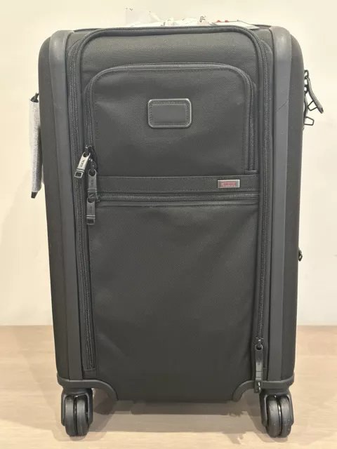 NEW TUMI International Dual Access 4 Wheeled Carry-On; Black