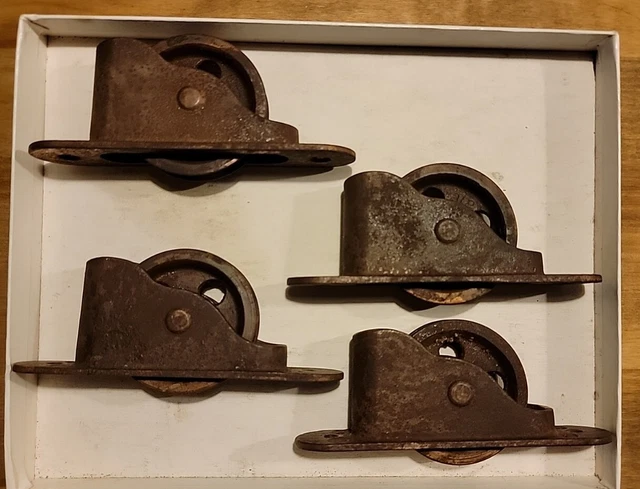 Set of 4 Original Antique Cast Iron Pocket Door Rollers Awesome Patina. WORKING
