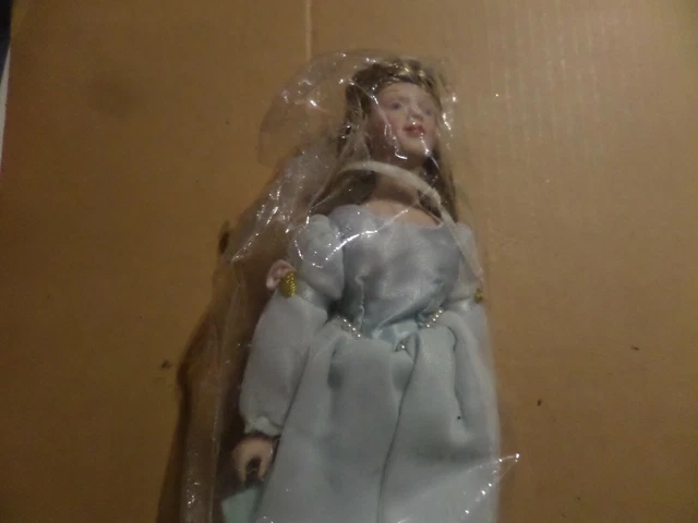 Avon Vintage Fairy Tale Doll Collection Cinderella Porcelain doll with stand