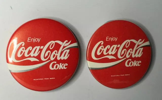 pair of 1990's Coca Cola Advertising pin badges 38 mm