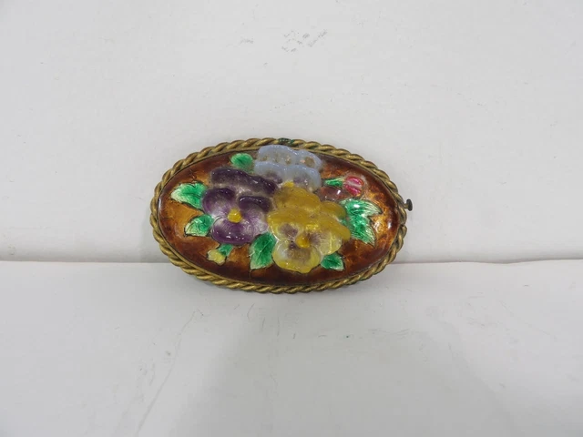 Broche ovale dorée à décor de fleurs, larg. 6 cm, (1970-1980) - Les
