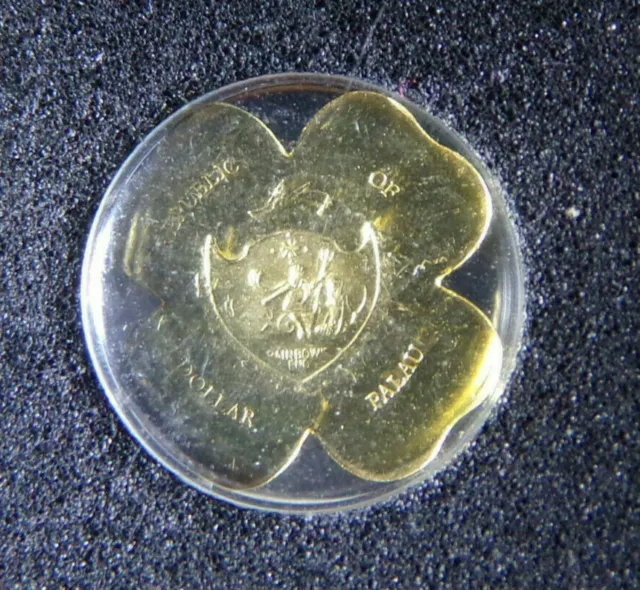 Republic of Palau, four leaf clover, gold coin, 1 dollar