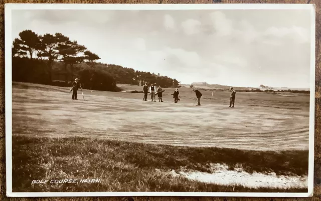 RPPC VIEW OF GOLFERS AND CADDIES ON GREEN AT NAIRN GOLF COURSE INVERNESS 1940’s