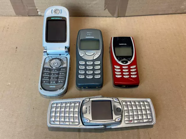 Four classic mobile phones Nokia 6822A flip - 8210 - 3210 and Motorola V600 flip