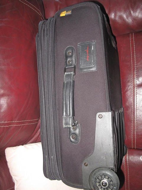 Kirkland Signature Duramax 20” Upright CarryOn Expandable Wheeled Suitcase Black 10