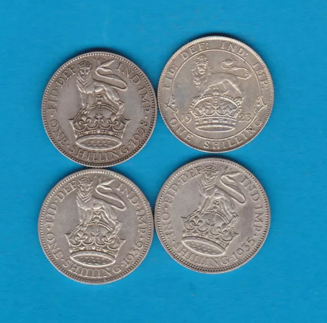 Four 1923/1928/1935 & 1936 George V Silver Shillings In Very Fine Condition.