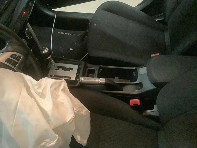 Used Front Lower Center Console fits: 2016 Mitsubishi Lancer floor w/armrest Fro