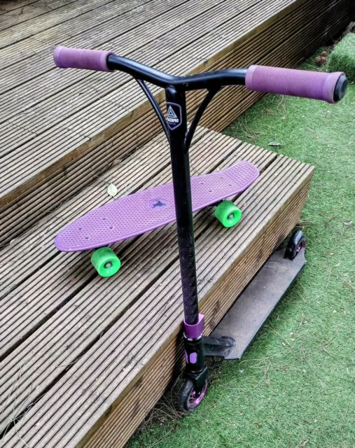 Blazer pro stunt scooter, Purple, good condition. Includes a skate board