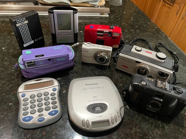 CAMERA AND MISC LOT inc clocks and calculator