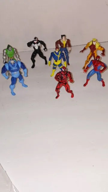 Lot of 8 VTG early 90’s Marvel Action Figures Toy Biz Inc. Cast Iron mixed lot