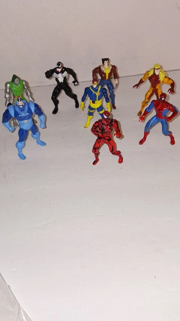 Lot of 8 VTG early 90’s Marvel Action Figures Toy Biz Inc. Cast Iron mixed lot