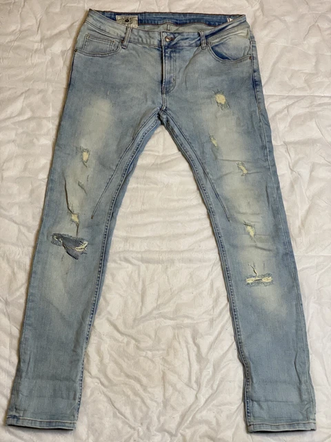 Jeans neri deals strappati zara