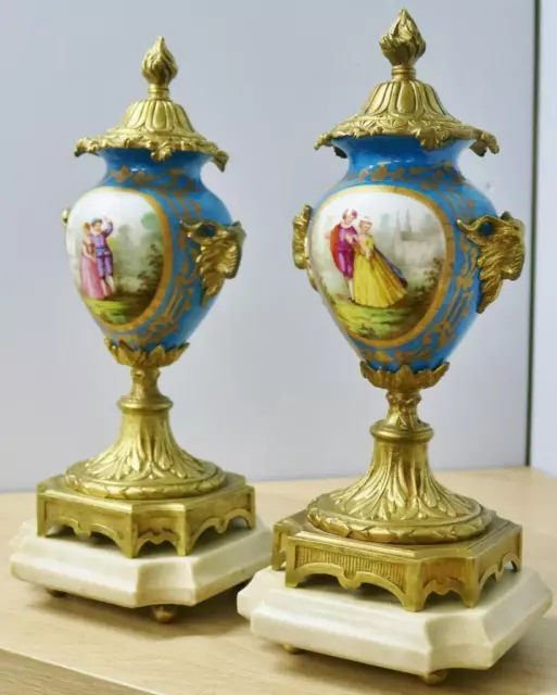 Pair Of Antique French Bronze Ormolu & Sevres Porcelain Mantle Clock Garnitures