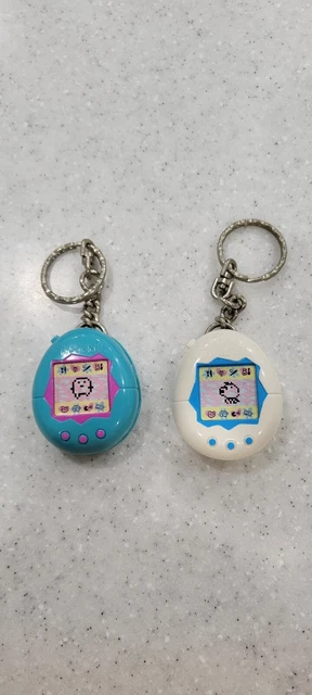 Vintage 1997 McDonalds Happy Meal Toy RED And YELLOW Tamagotchi Keychain 02