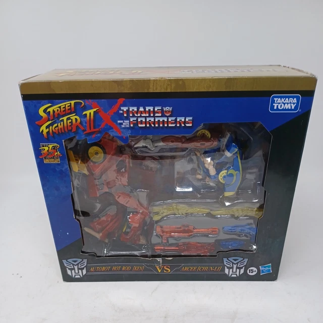 Hasbro Street Fighter II X Transformers Autobot Hot Rod (Ken) Vs Arcee (Chun-Li) Hasbro Street Fighter II X Transformers Autobot Hot Rod (Ken) Vs Arcee (Chun-Li)