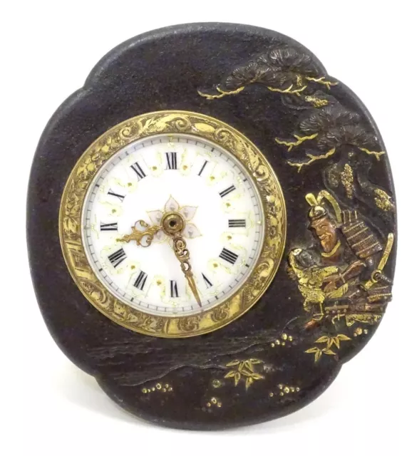 Japanese Antique Tsuba   has had a small clock fitted for using display !