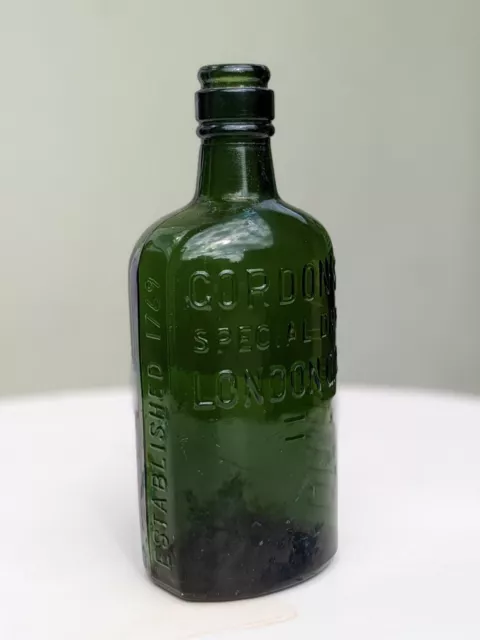 Vintage glass bottle : Gordons Gin Special Dry London. Green. 1920s?