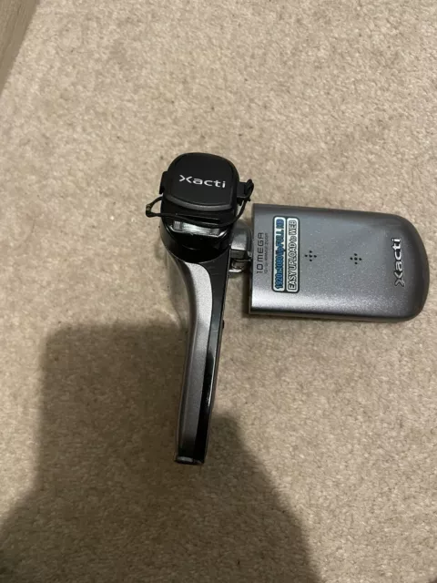Sanyo Xacti CG20 Digital Camera  Camcorder | Silver, Includes Battery, Charger,