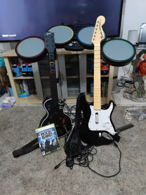 Xbox 360 Rock Band Drum And Guitar Set Has The Microphone And Pedal With It