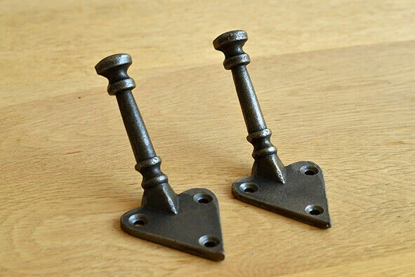 A pair of Arts & Crafts coathook coat hook towel hook cast iron hanger