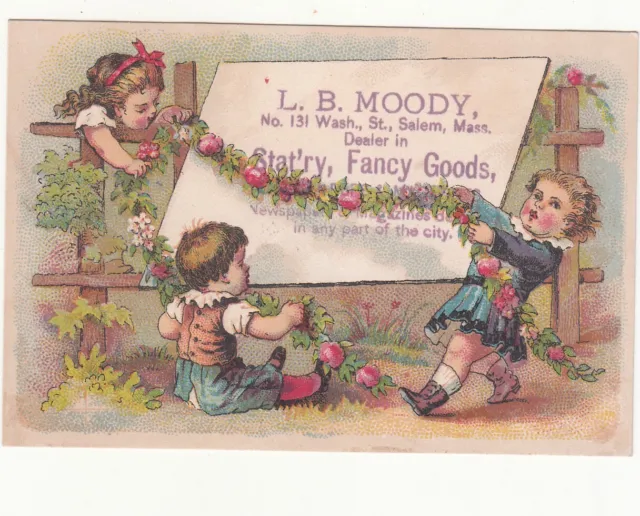 L B Moody Fancy Goods Stationery Salem MA Rose Garland Sign Vict Card c1880s