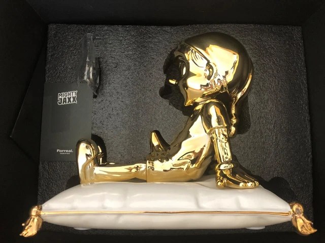 Figurine Mighty Jaxx Pinocchio édition Chrome Or – Signée Juce Gace