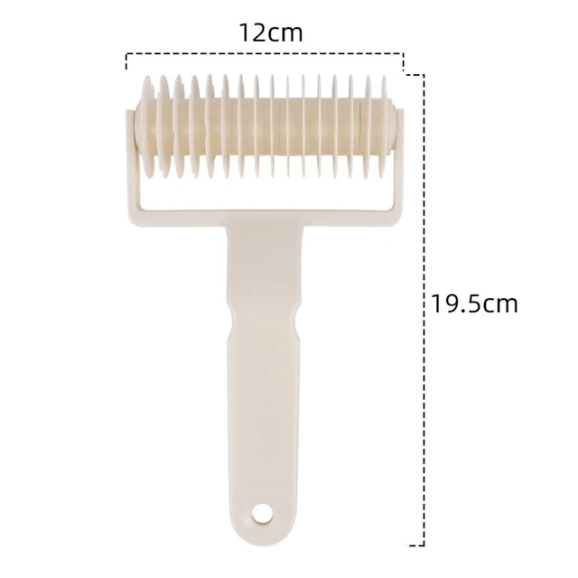 Strumento tagliarotoli tagliatorte plastica tagliapizza scooter 19,5*12 cm