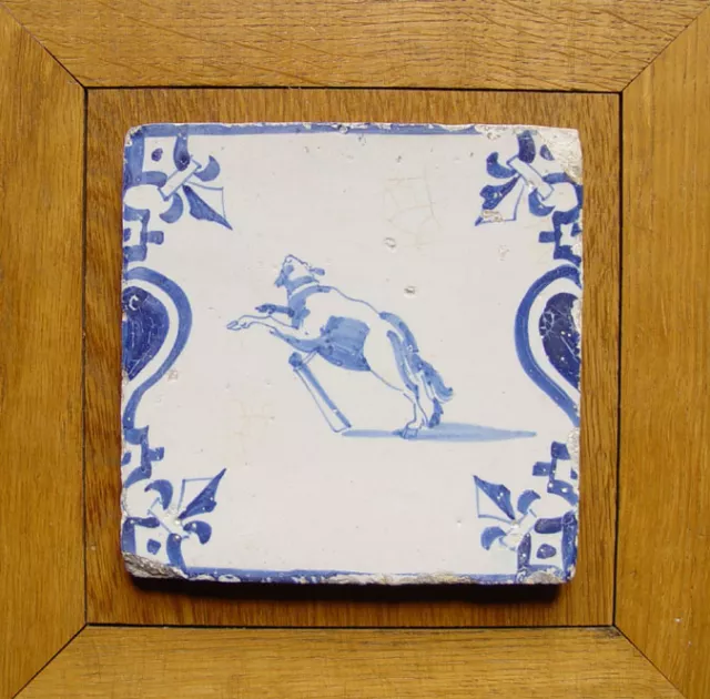 Rare Dutch Delft Tile Fastened Dog 17th C.