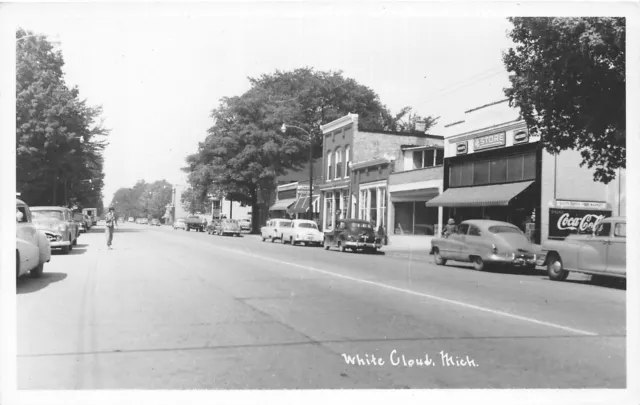 H50/ White Cloud Michigan RPPC Postcard c1940s Stores Automobiles  125