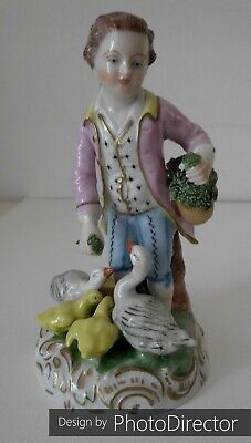 Figura de porcelana Potschappel Dresde niño con pájaro pato ganso excelente estado
