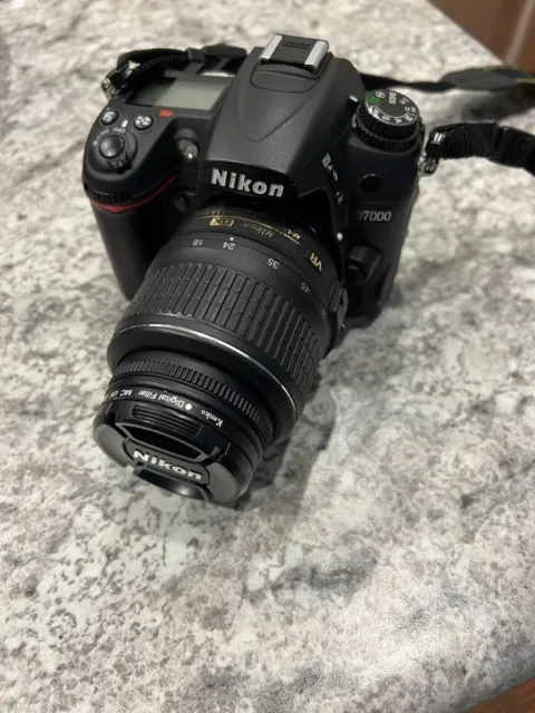 Nikon D D7000 16.2 MP Digital SLR Camera - Black. Barely Used, with lens.