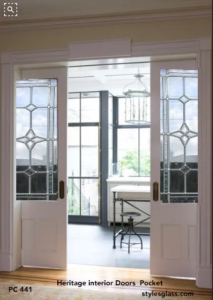 Beautiful Interior Pocket Doors with 3/4 Glass with Heritage design panels