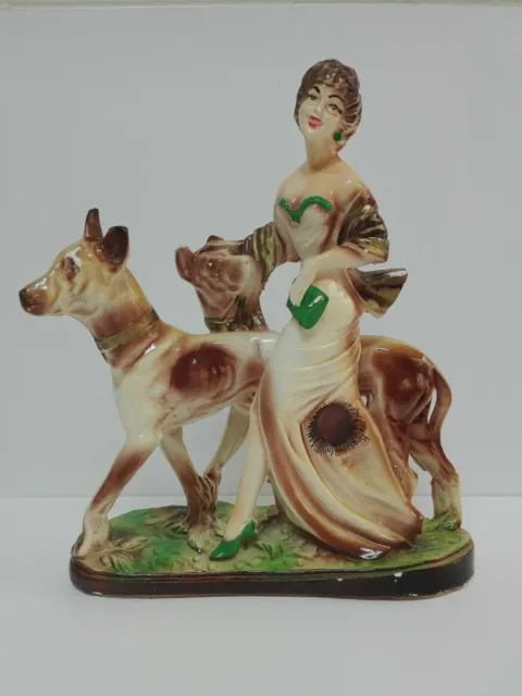 Ancienne figurine en porcelaine signée A. SANTINI Femme promenant des...
