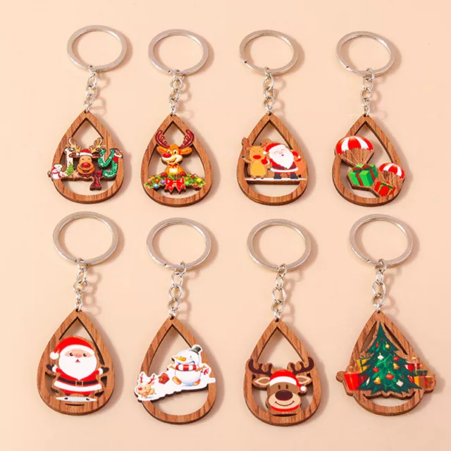 https://www.picclickimg.com/W9EAAOSwmgllgd-A/Christmas-Wooden-Elk-Snowman-Keychain-Drop-Shaped-Car-Key.webp