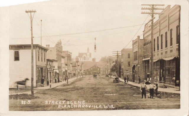 BLANCHARDVILLE WI rppc c1910 STREET SCENE T. S. Ryan Saloon HOTEL Wisconsin