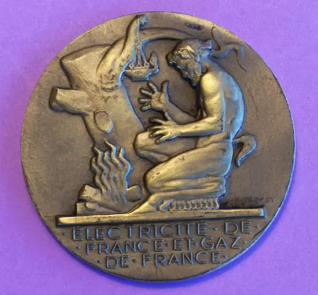 Médaille de table en bronze patiné " Electricité de France " (diam: 5.5 cm)