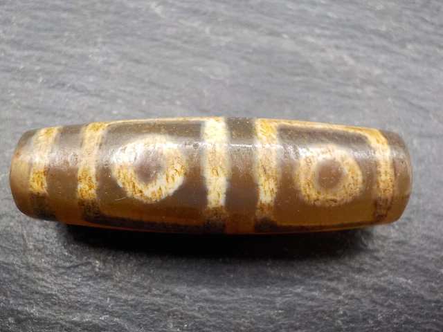 An Agate Dzi bead with a 4 Eye pattern from Tibet / Nepal.