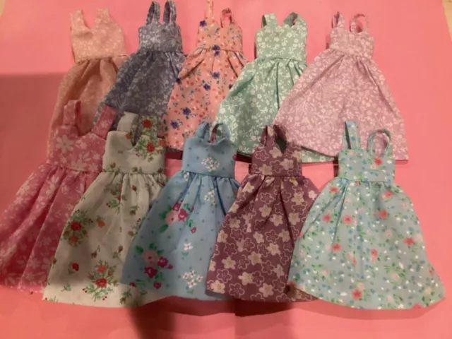 Ten 12 th scale dollshouse dresses