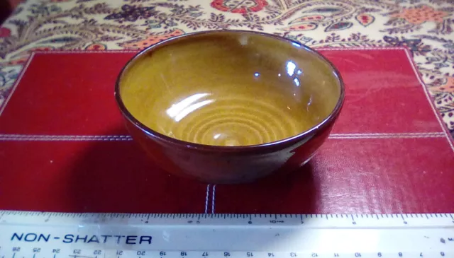 Art Pottery Earthenware Brown & Ochre Glazed bowl. Signed JO chelt 68. 1.75"Tall