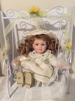 Beautiful Emerald Doll Collection "Lyndia" Porcelain Doll With Swing