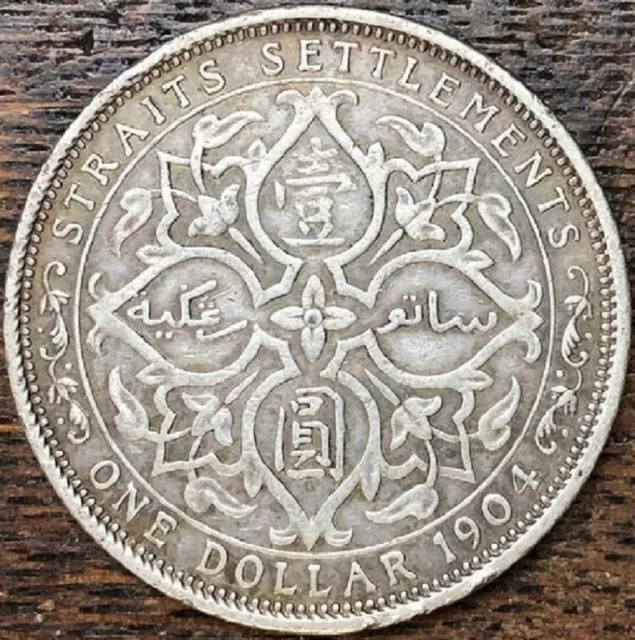 #43: 1904B Straits Settlements Kevii $1.00 0.900 Fine Silver Coin Vf+
