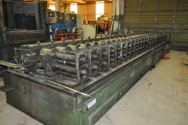 24 Stand x 3" Shaft Tishken Roll Former 24 HWS Roll Space: 36" 40 HP Yoder
