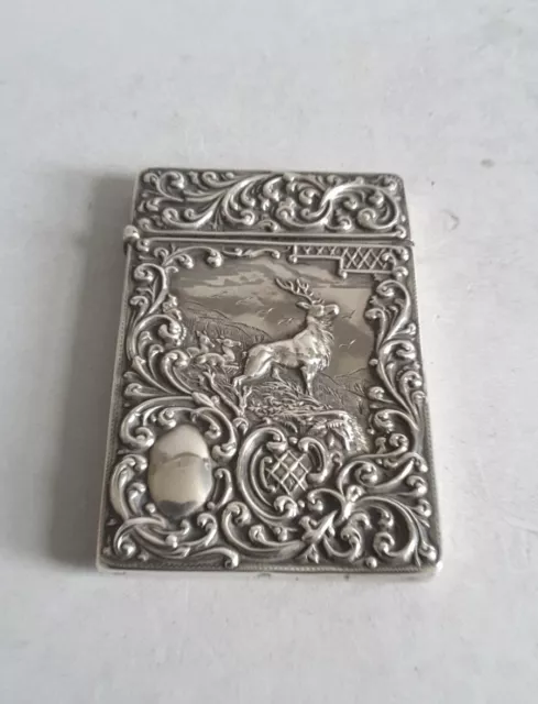 GOOD ANTIQUE SOLID SILVER EMBOSSED CARD CASE.       HT. 10cms.      BIRM.  1902.