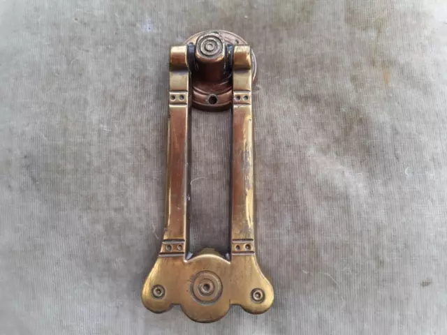 Vintage brass door knocker in good used condition.